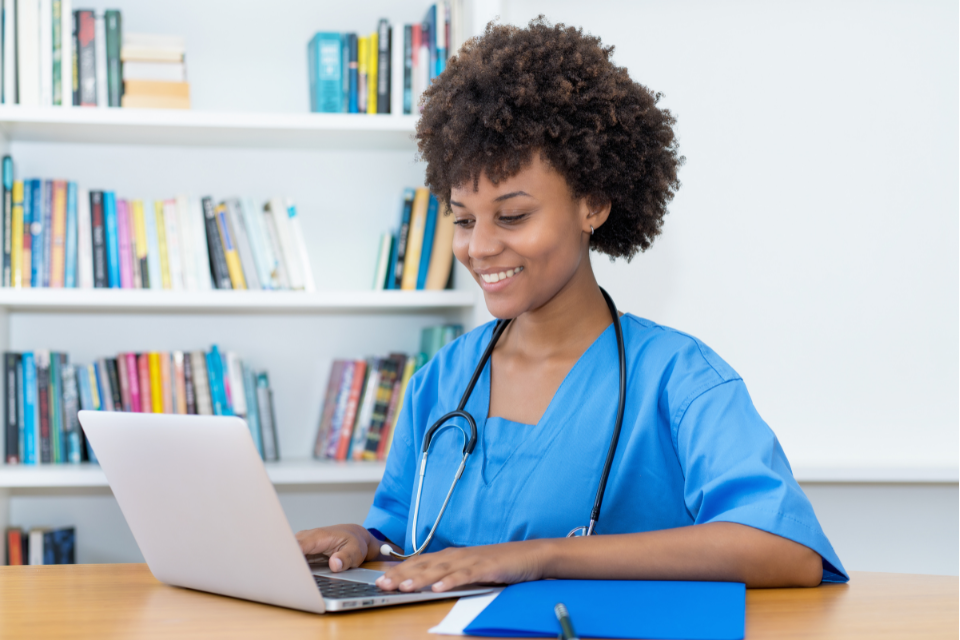 health practitioner on laptop